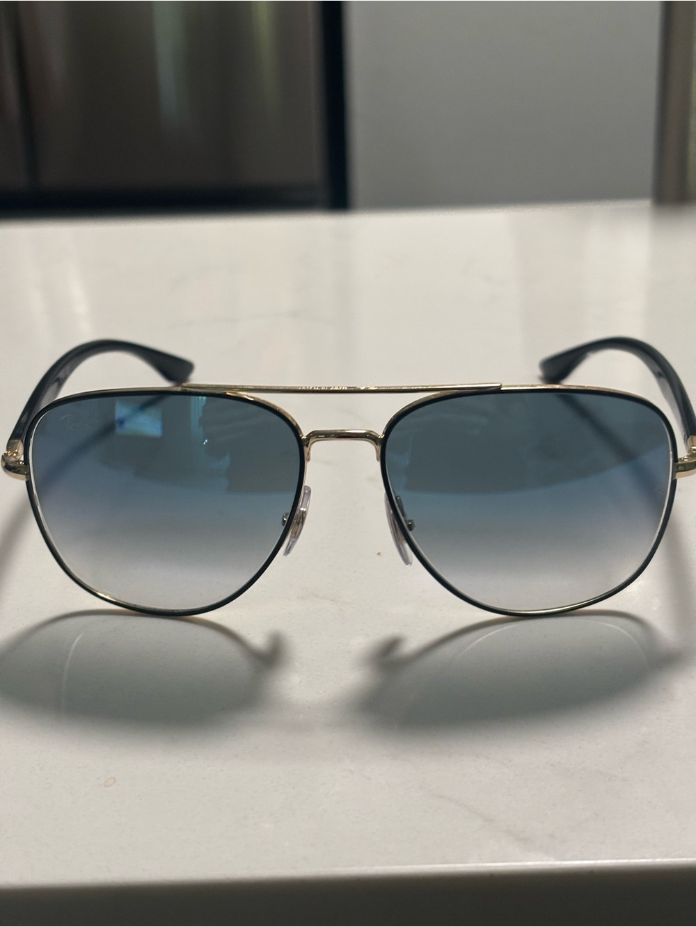 Ray-Ban, square aviators. Gold frame with light blue lenses. Excellent condition